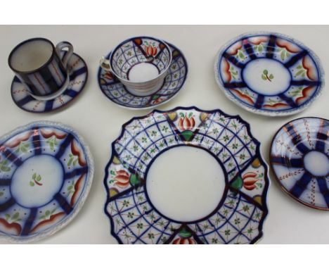 A Gaudy Welsh trellis pattern tea cup, saucer and bread and butter plate, together with a gaudy welsh coffee can and two sauc