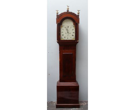 A 19th century mahogany longcase clock, the arched hood with brass globe finials above a short trunk door, box base and brack