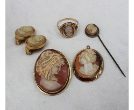 A cameo brooch, depicting a maiden in profile, together with cameo earrings, stick pin etc