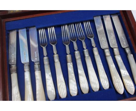 A Victorian silver and mother of pearl matched part fruit set, comprising six knives and six forks, Birmingham & London, vari