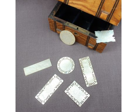 A 19th century ash casket, with raised square decoration and inlaid chequer banding, enclosing a compartmented interior and C