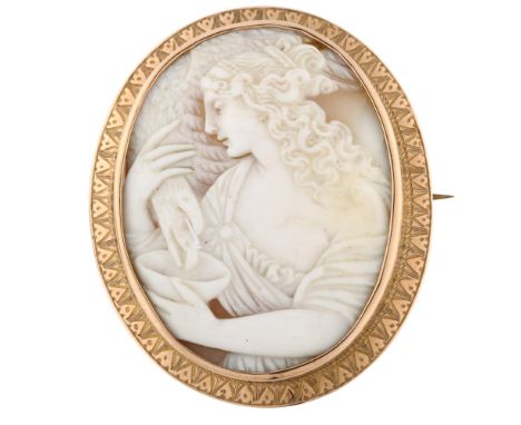 A Victorian shell cameo brooch, depicting Hebe feeding eagle Zeus, relief carved with unmarked rose metal engrave frame, over