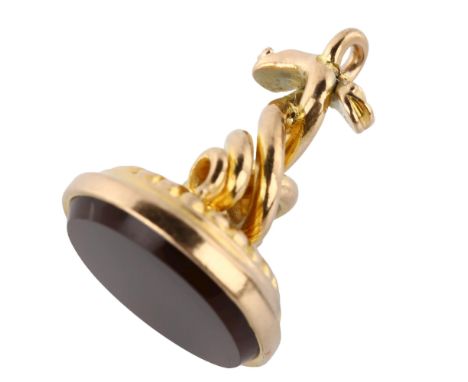 A 9ct gold hardstone entwined serpent seal fob, indistinct hallmarks, panel length 18mm, fob height 22.4mm, 5.8gNo damage or 