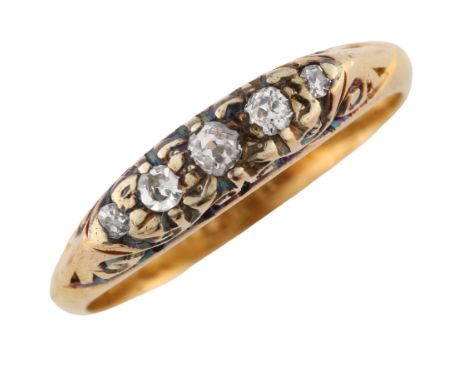 An early 20th century 18ct gold graduated five stone diamond half hoop ring, set with old-cut diamonds, setting height 4mm, s