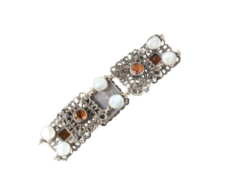 An Arts and Crafts citrine and blister pearl panel bracelet, unmarked silver settings with pierced decoration, bracelet lengt