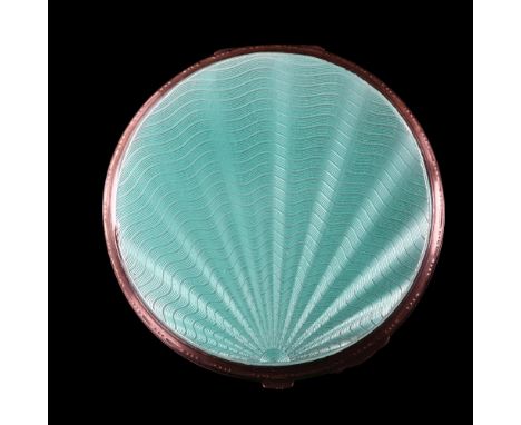 An Art Deco George VI silver and green enamel compact, circular form with engine turned sunburst decoration, by Bravingtons L