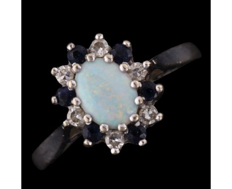 An 18ct white gold opal sapphire and diamond cluster ring, setting height 12mm, size N, 4.3gNo damage or repairs, all stones 