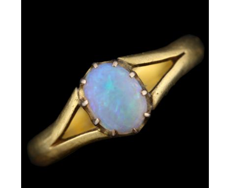A Victorian 22ct gold opal dress ring, set with oval cabochon white opal, setting height 7.8mm, size P, 3.2gNo damage or repa