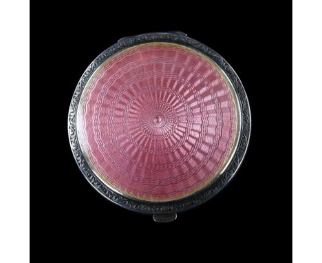 An Art Deco George V silver and pink enamel compact, circular form with engine turned decoration, by Crisford & Norris, hallm