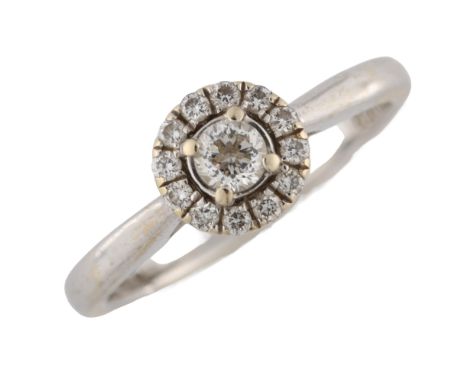 A modern 18ct white gold diamond cluster ring, set wtih modern round brilliant-cut diamonds, total diamond content approx 0.2