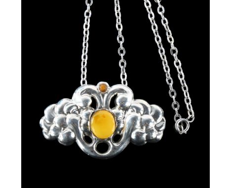 KNUD GEORG JENSEN - an Art Nouveau Danish silver and amber abstract pendant necklace on unmarked white metal cable link chain