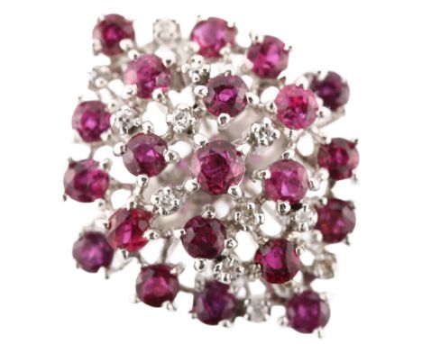 A large 18ct white gold ruby and diamond cocktail ring, set with round-cut rubies and single-cut diamonds, setting height 28m