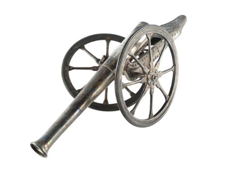 A good quality early 20th century Indian white metal model table cannon, inscribed "Gun Carriage Factory, Jubbulpore India Oc