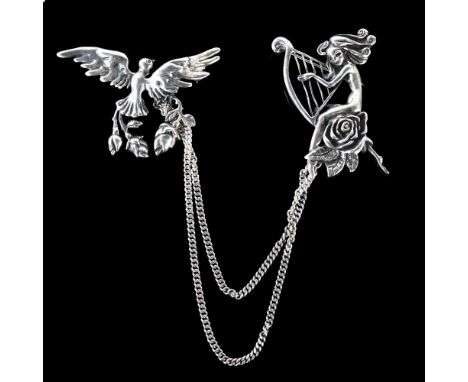 CYRIL & VERA WOOD (CYVRA) - a 1950s American designer silver double figural brooch, depicting girl with a harp and dove, on s