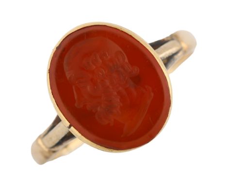 An Antique carnelian ring stone, intaglio carved depicting male portrait, in unmarked gold setting, setting height 12.7mm, si