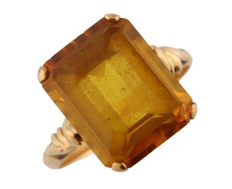 A Chinese 14ct gold heliodor dress ring, set with emerald step-cut heliodor, stone length 13.7mm, size N, 4.1gNo damage or re