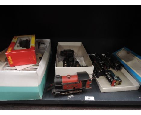 A shelf of railway items including Hornby 0 gauge clockwork 0-4-0 LMS engine, Hornby and plastic 00 gauge, many photographs e