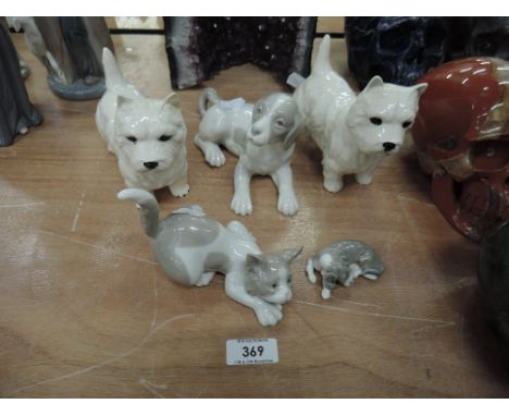Two Beswick studies, Scottie Dogs (1af), two Llladro studies, Cat and Puppy and a Nao study, large puppy