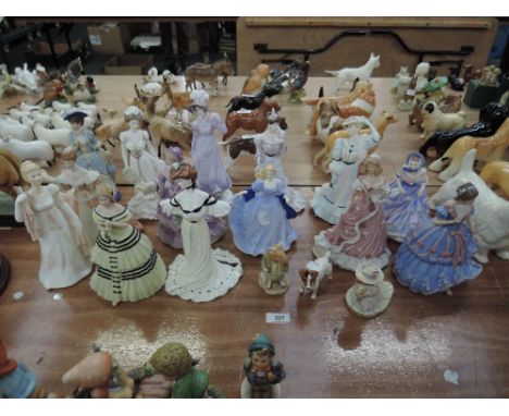 Fourteen modern Wedgwood, Royal Worcester, Royal Doulton and similar figurines, two Royal Doulton Brambly Hedge figures and a