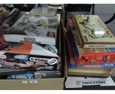 A collection of modern Meccano and similar construction sets including Crazy Inventors, Light and Music System, Metal Robots 