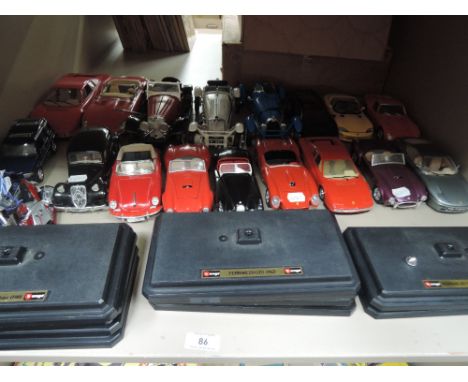 A shelf of  Burago and similar 1:18 and 1:24 scale vintage cars including Citroen, Porsche, Ferrari etc along with similar mo