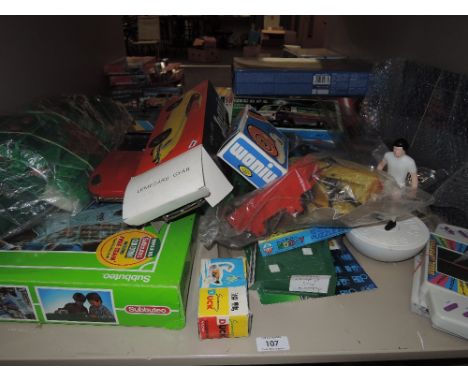 A shelf of mixed vintage toys including Subbuteo part sets, Lemezaru Gyar and similar tin plate and friction driven toys, etc