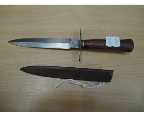 A French World War I Gonon trench dagger, with metal scabbard