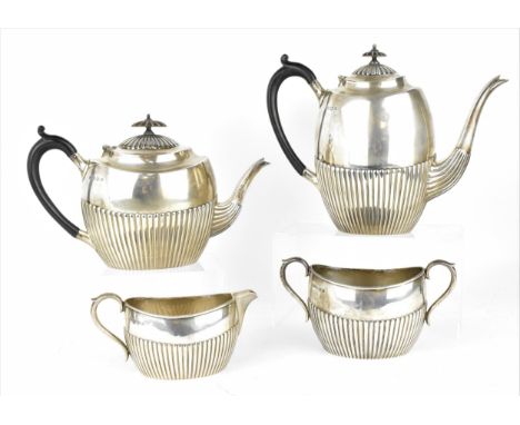 An Edwardian silver tea and coffee set by Elkington &amp; Co Ltd, Birmingham 1908, comprising one teapot, one coffee pot, one