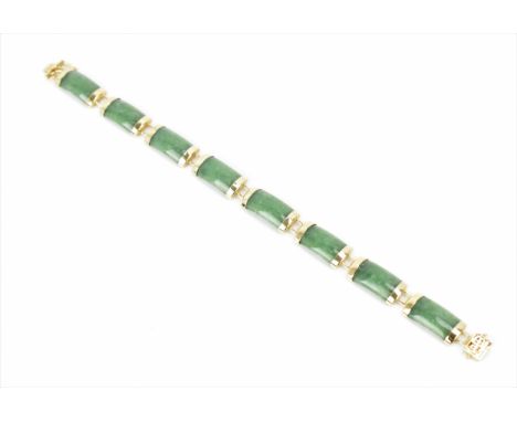 A Chinese 14ct yellow gold and green jade bracelet, with rectangular links, the clasp with Chinese character, hallmarked 585,