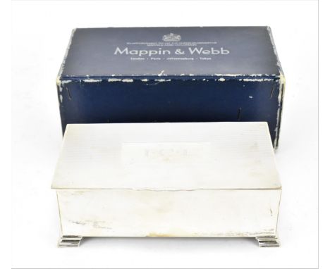 A George VI silver cigarette box by Mappin &amp; Webb, Birmingham 1947, of rectangular form with engine turned lid, the insid