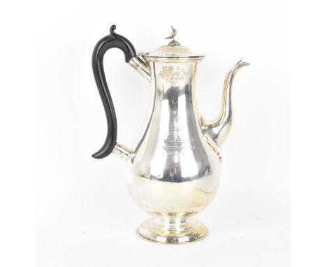 A Victorian silver teapot by William Hutton &amp; Sons, London 1881, with baluster body, bird finial, ebonised scroll handle,