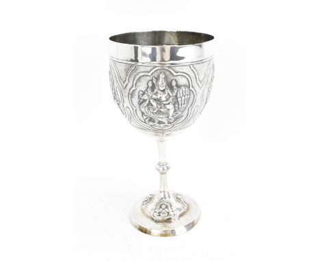 An Indian colonial silver trophy goblet by Peter Orr &amp; Sons, Madras, late 19th century, the bowl with embossed deity astr