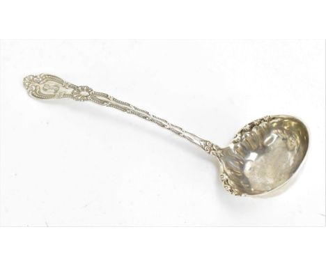 A late 19th century American silver ladle by Alvin Manufacturing Co., with ornate handle designed with scrolls and beaded bor