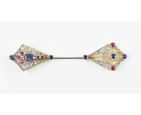 An Art Deco diamond, blue sapphire and ruby jabot pin, each end with different stone arrangement, one with flower design, the