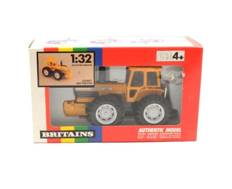 Britains Farm toy, ref 9521 county 1884 tractor, orange/yellow body, boxed.
