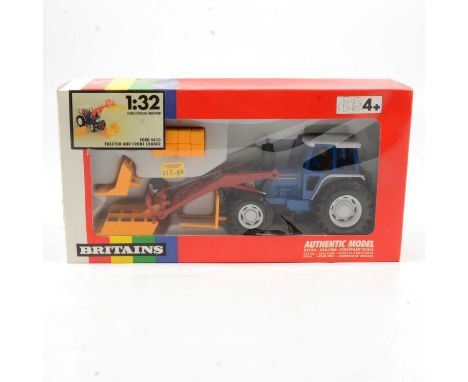 Britains Farm toy, ref 9617 Ford 5610 tractor and front loader, boxed. 
