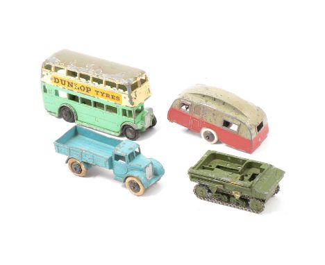 Dinky Toy die-cast models, four pre-war examples including 29c Double Decker bus, green; 30g caravan, grey and maroon (replac
