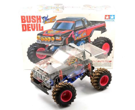 Tamiya 1:10 scale off-road pick-up 'Bush Devil' remote control car, boxed with unused transfers, instructions, Tamiya control