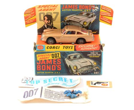 Corgi Toys die-cast model 261 Special Agent 007 James Bond's Aston Martin DB5 'Goldfinger', with three spare figures, secret 