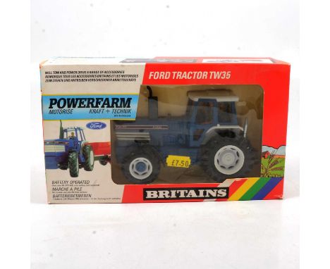 Britains Farm toy, ref 9321 Ford TW35 tractor 'Powerfarm' motorised, boxed.