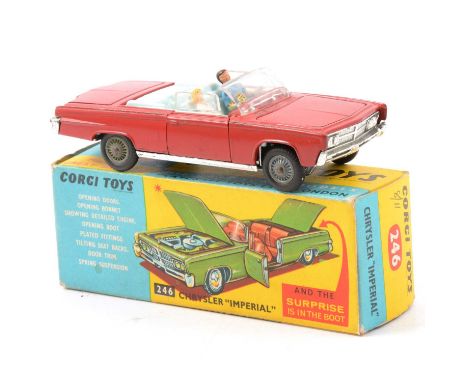 Corgi Toys die-cast model 246 Chrysler Imperial, red body, pale blue seats, two figures, boxed.