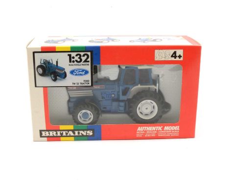 Britains Farm toy, ref 9508 Ford TW 25 tractor, boxed.
