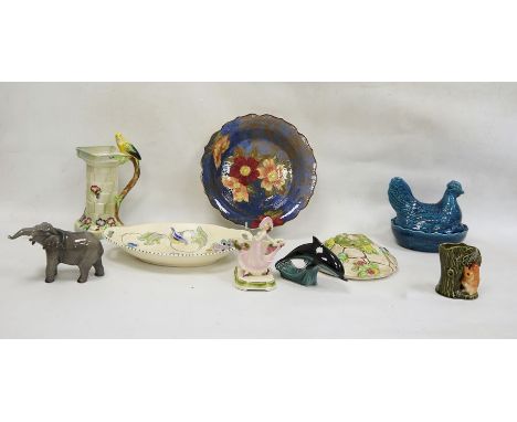 Honiton pottery oval two-handled dish, a Royal Doulton floral decorated bowl, a Beswick model of an elephant, a Poole pottery