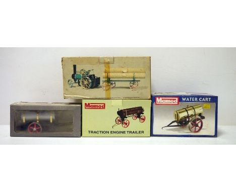 Mamod water cart, boxed, Mamod Traction engine, boxed, Mamod Traction engine trailer, boxed and a Wilesco water cart, boxed (