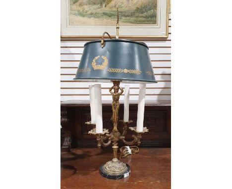 Four-branch gilt metal table lamp with central female figure supporting a basket of fruit, on circular veined marble base, wi