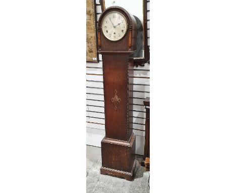Early 20th century oak longcase clock of small proportions, the arched top above circular dial with Arabic numerals