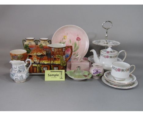 A collection of Royal Albert Silver Maple pattern wares including a two tier cake stand, a milk and cream jug, small sugar bo