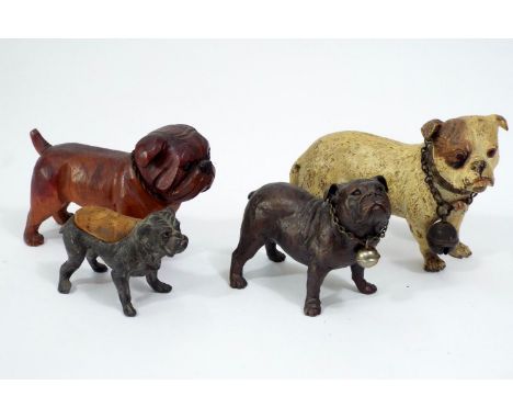 A cold cast bronze figure of a Bulldog in a white colourway, a further spelter pin cushion in the form of a Bulldog, a furthe