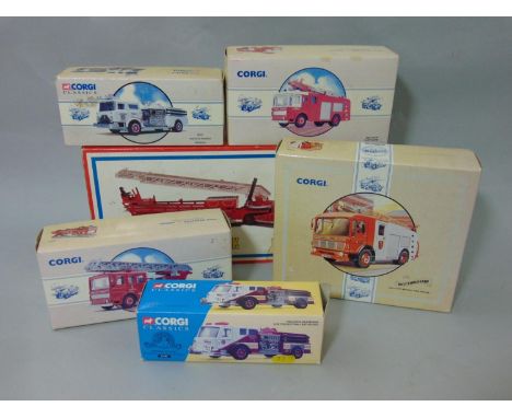 A collection of boxed Corgi Fire Service Trucks including a Mack CF Pumper, American La France Aerial Ladder Truck, AEC Pump 