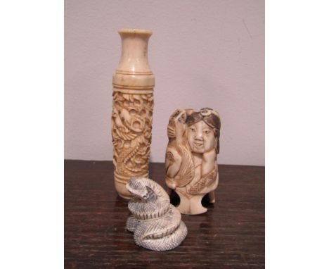 Japanese ivory netsuke in the form of a snake 3 cm high, with a carved bone vase and figure possibly a walking stick knop (3)